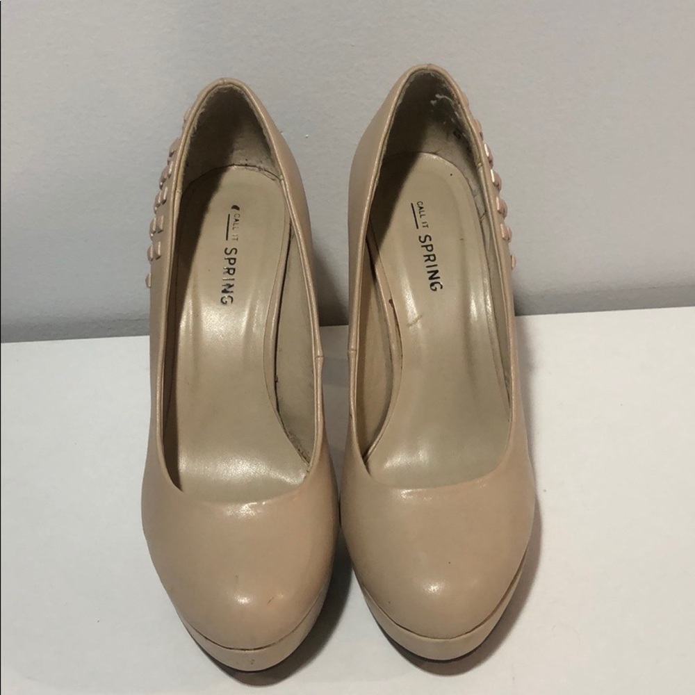 Nude studded high heel shoes